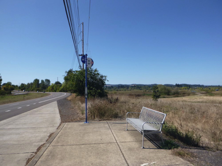 Bus stop and bench on Highway 99 - no access across highway - take bus to Sherwood to circle back Bus stop and bench on Highway 99 - no access across highway - take bus to Sherwood to circle back